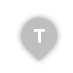 Standortsymbol in Grau mit "T" für TBAK